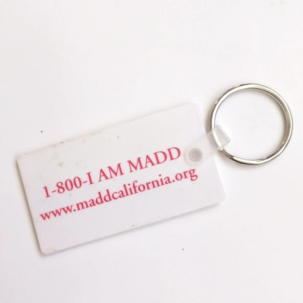 Vintage 90s Y2K MADD Keychain White California Mothers Against Drunk Driving